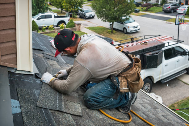 Professional Roof Replacement technician working in Piney Fork, OH
